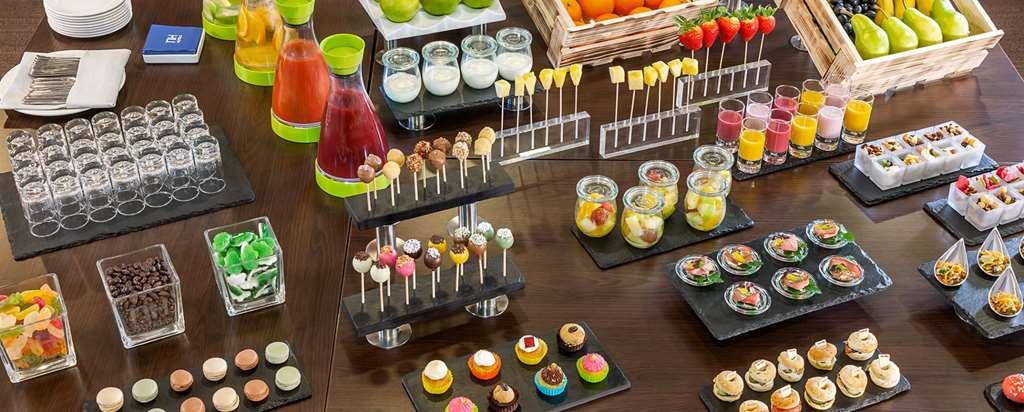 Nh Timisoara Hotell Restaurang bild